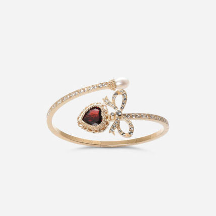 BRACCIALE HEART IN ORO GIALLO CON CUORE E FIOCCO