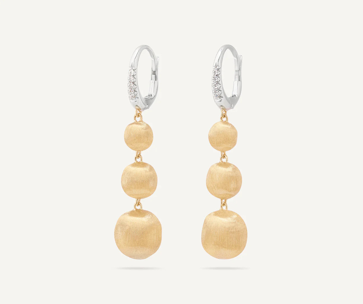 AFRICA  Orecchini pendenti graduati in oro giallo 18 carati con chiusura a clip con diamante